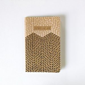 genius lives here moleskine notebook handpainted with stitch like brushstrokes in blush and black by messy bed studio