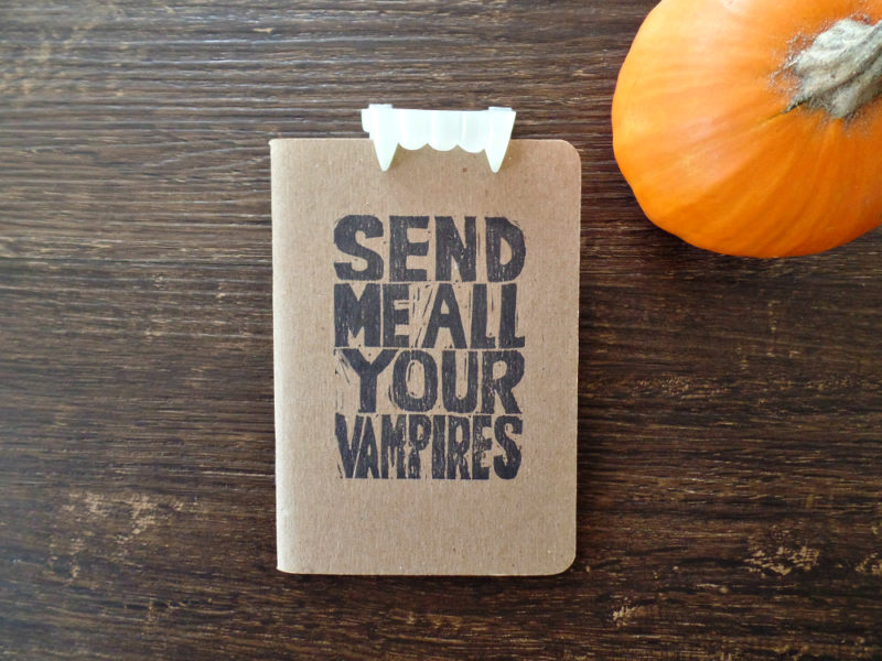vampire teeth with send me all your vampires notebook