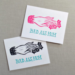 bad ass mom mothers day cards in pink and black by messy bed studio