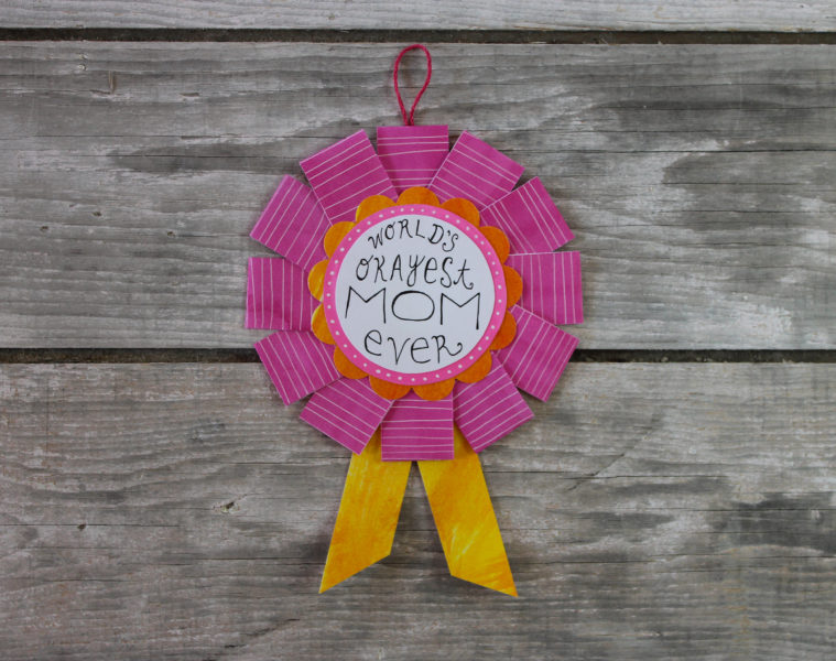 world's okayest mom award in pink and orange