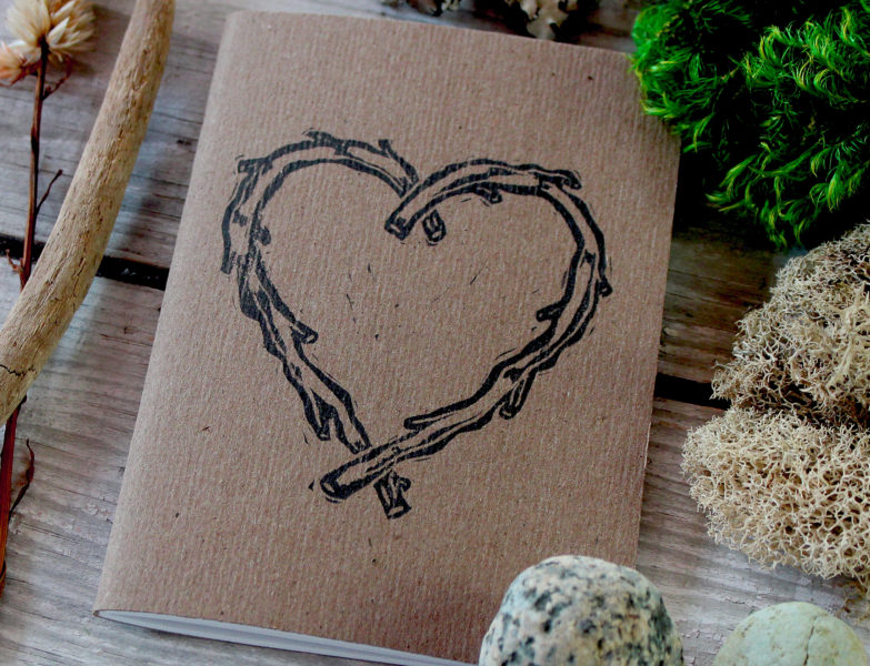 detail of rustic heart vow book