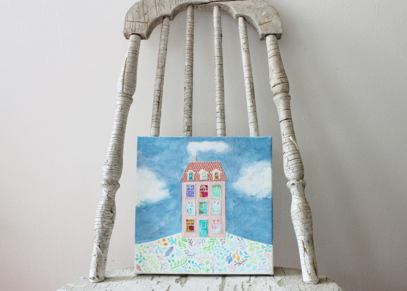 mixed media house artwork on vintage chair