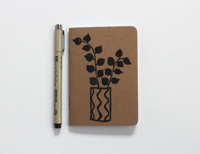 plants in pots hand printed small notebook and pen