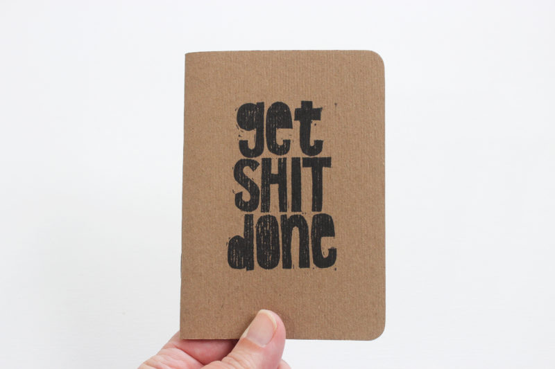 get shit done pocket notebook in hand