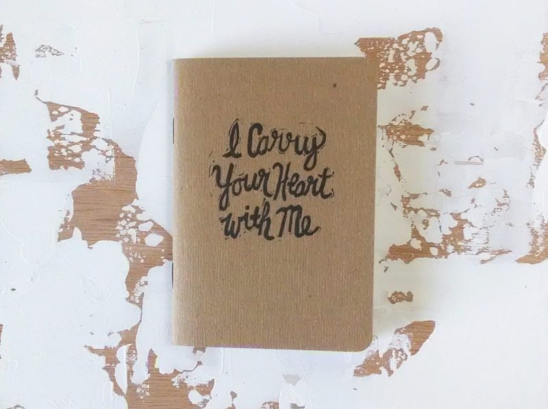 I carry your heart hand printed in black ink notebook by messy bed studio