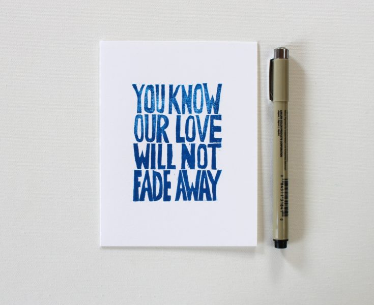 you know our love will not fade away cards in blue ink on white card shown with a pen by messy bed studio