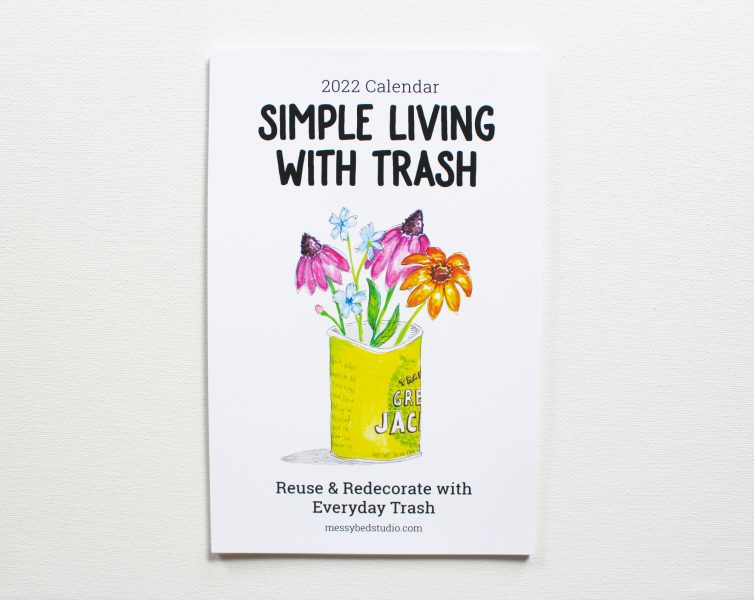 Simple living with trash 2022 wall calendar cover with watercolor painting of flowers in a recycled food can