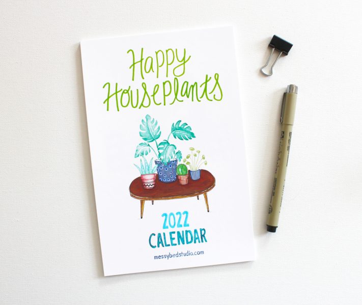 2022 plant mom calendar cover handpainted in watercolors shown with pen and clip
